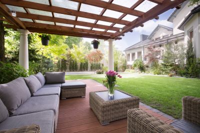 How A Freestanding Porch Installation Enhances Backyard Functionality